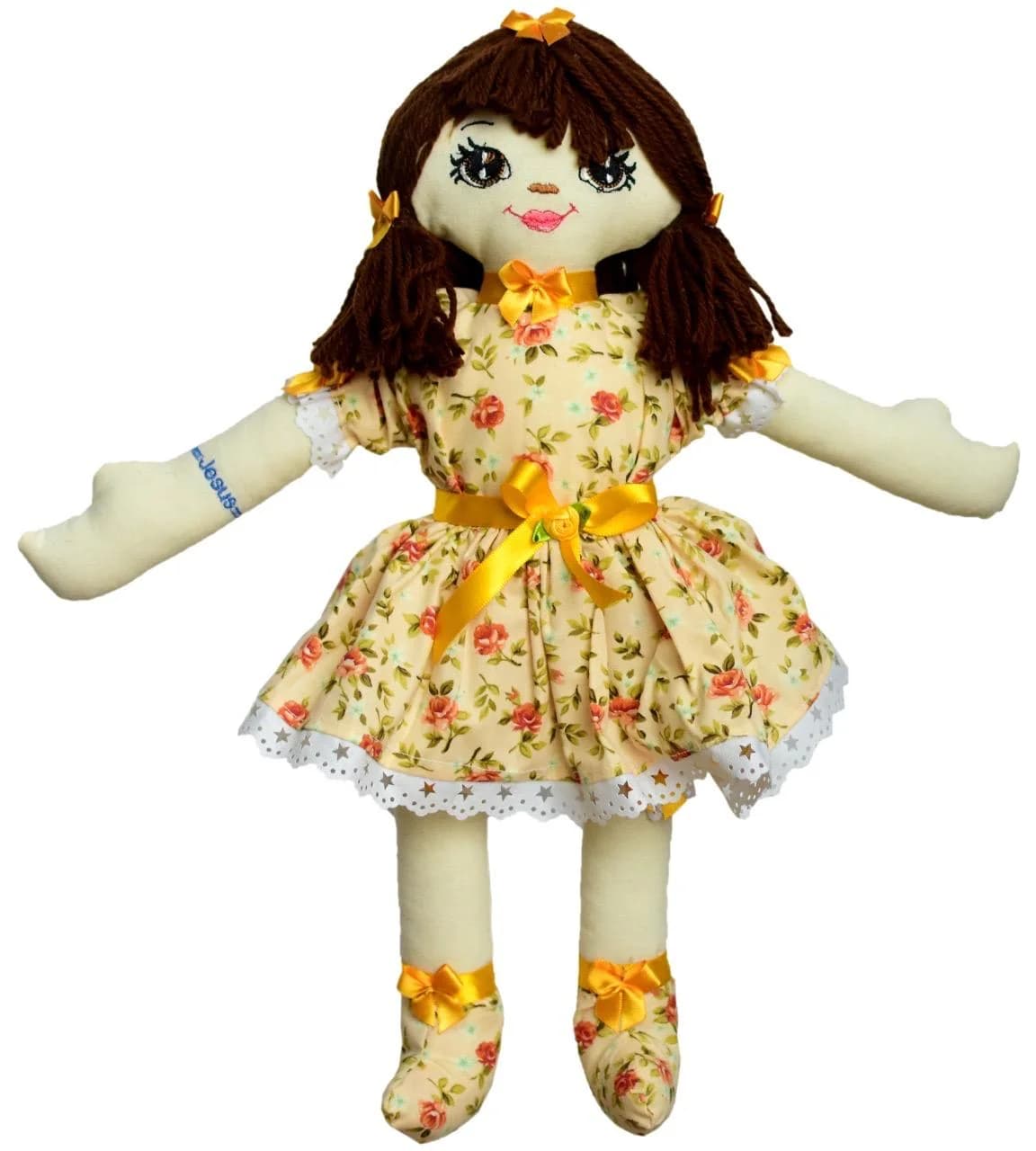 Boneca Rebeca: Cabelos castanhos, vestido creme com flores e laços amarelos.